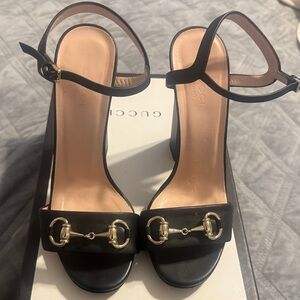 Gucci Black Heels with Gold Accents